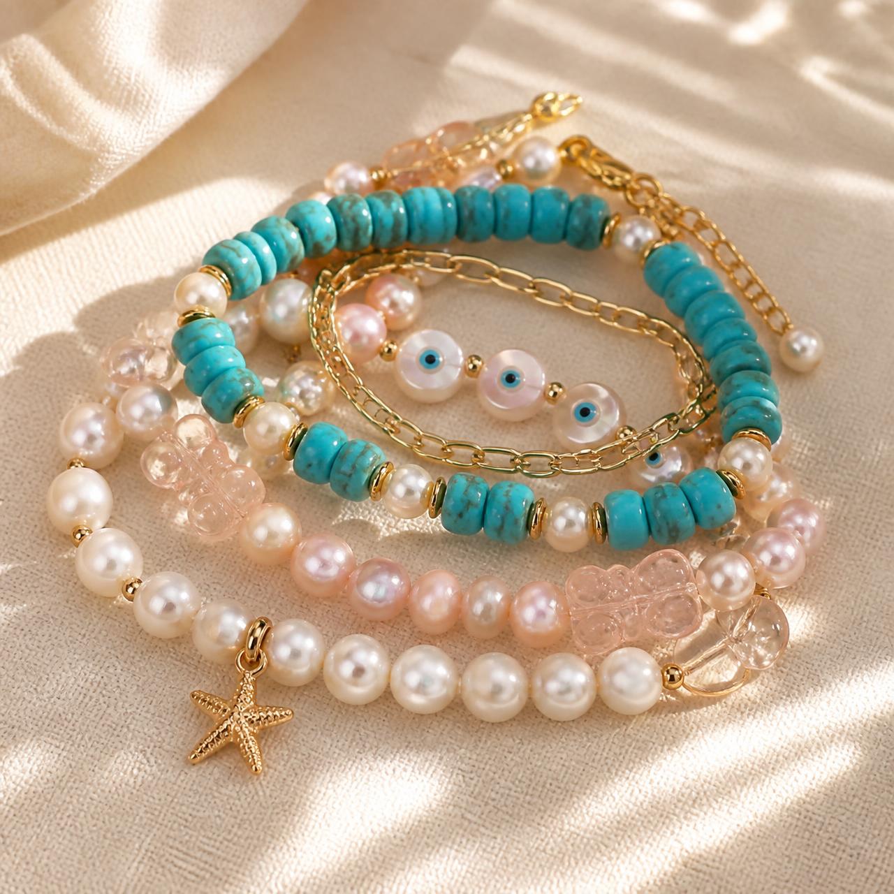 Stack of layered handmade bracelets